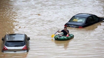 Download Video: 'Grim': China battles record flooding after torrential downpours