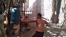 Boxer uses metal gas tanks as punch bags