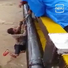 Watch: Disaster Management Agency Rescues Stranded Couple Due To Heavy Flooding