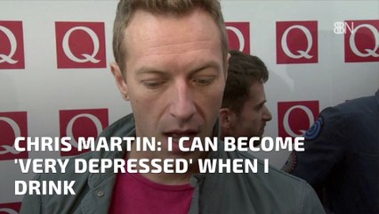 Chris Martin With A Bottle