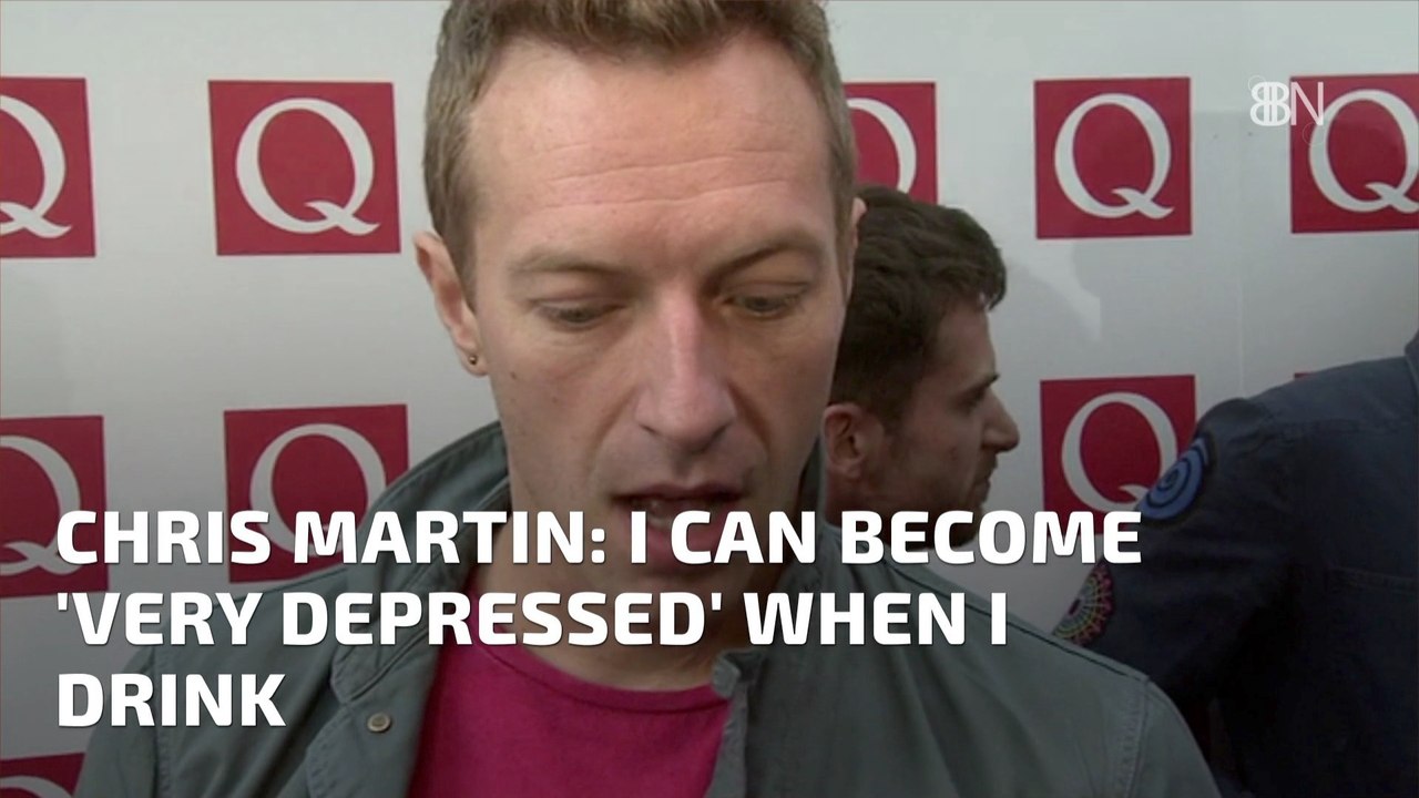 Chris Martin With A Bottle