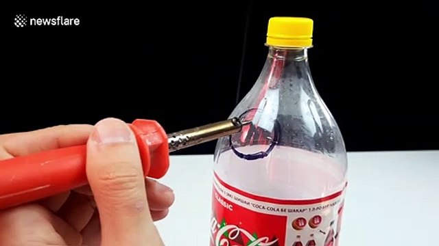 Vlogger shows how to make a homemade hookah pipe from plastic bottle