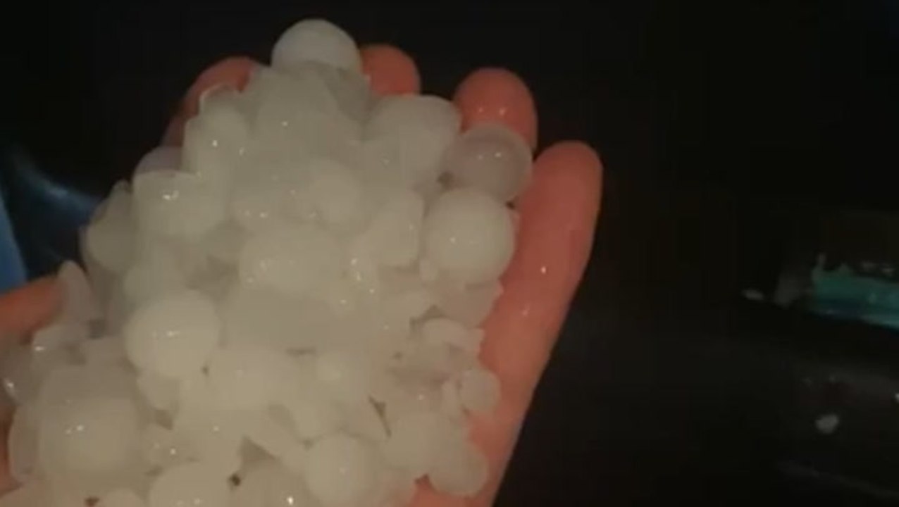 Marble-sized hailstones damage cars and properties