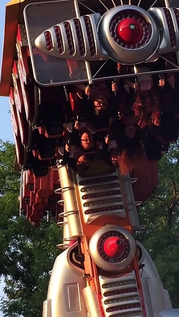 Amusement Park Ride Stops Upside-Down