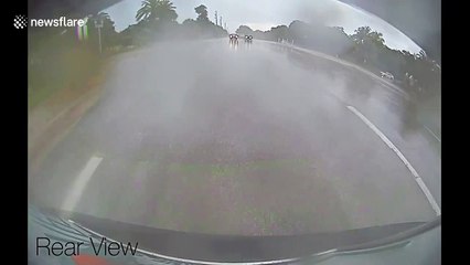 Intense moment in Florida when Tesla bumper falls off while it rains