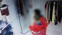 Vídeo mostra momento em que casal com criança no colo furta roupas em loja de Curitiba