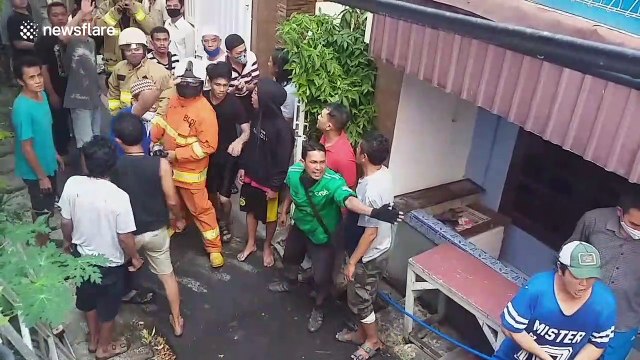 Dozens of homes destroyed as fire rips through residential area in Jakarta