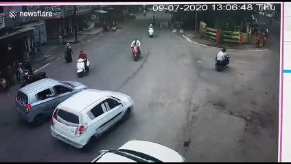 Miraculous escape for father and daughter after car runs head-on into them