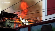 Dozens of homes destroyed as fire rips through residential area in Jakarta