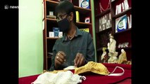 Indian goldsmith creates gold and silver masks to raise awareness on coronavirus protection