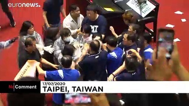 Punches and water balloons thrown in Taiwanese parliament melee