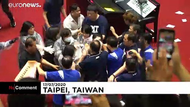 Punches and water balloons thrown in Taiwanese parliament melee