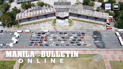 Hundreds line up for Manila City's free drive-thru COVID-19 testing centers