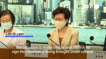 Hong Kong leader says coronavirus 'critical' after 100 new cases