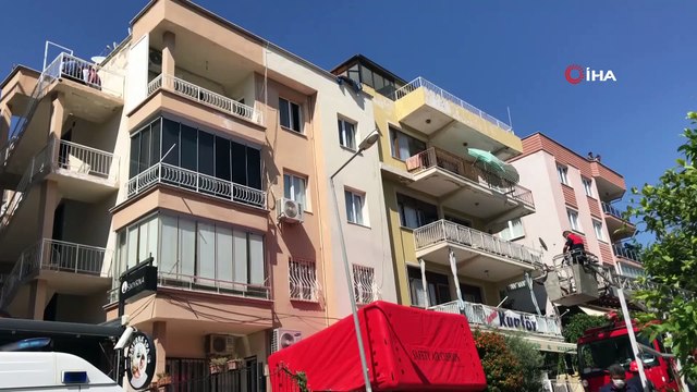 4 katlı binadan atlamak isteyen bir kişi polis ve itfaiye ekiplerine zor anlar yaşattı