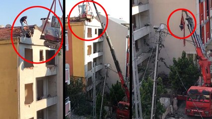 Arnavutköy'de vince bağlı iş makinasıyla tehlikeli yıkım