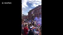 Leeds United fans go wild in Millennium Square after promotion to premier league