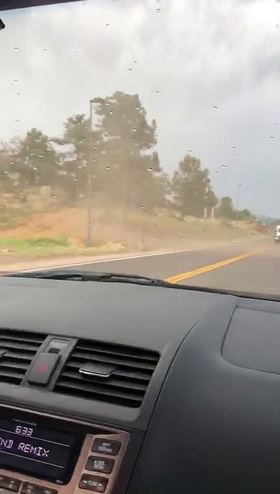 Dust Devil Cuts Through Traffic