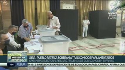 Скачать видео: Gran afluencia a las urnas marcan elecciones parlamentarias en Siria