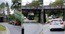 Camionista mostra como consegue passar numa ponte baixa