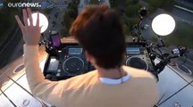 Belgian DJ gives silent performance atop Brussels landmark