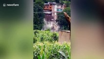 Family home in China completely collapses into river due to continuous rainfall