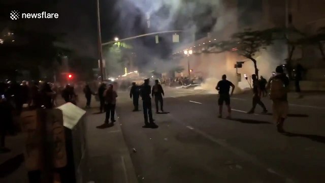 Federal agents fire tear gas and stun grenades to disperse Portland protesters