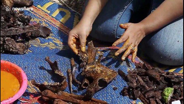 Indonesian tribe move bones of ancestors to new site in traditional ritual