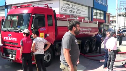 Konya'da tekstil dükkanlarının bulunduğu iş hanında çıkan çatı yangını söndürüldü