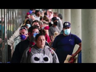 Jobless spike, stimulus fight spark stock drop