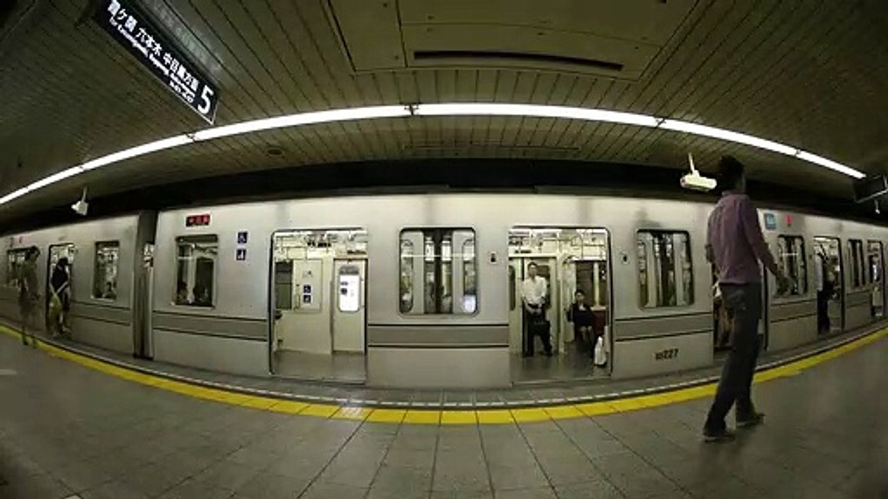 Fish eye lens shot of the subway arriving