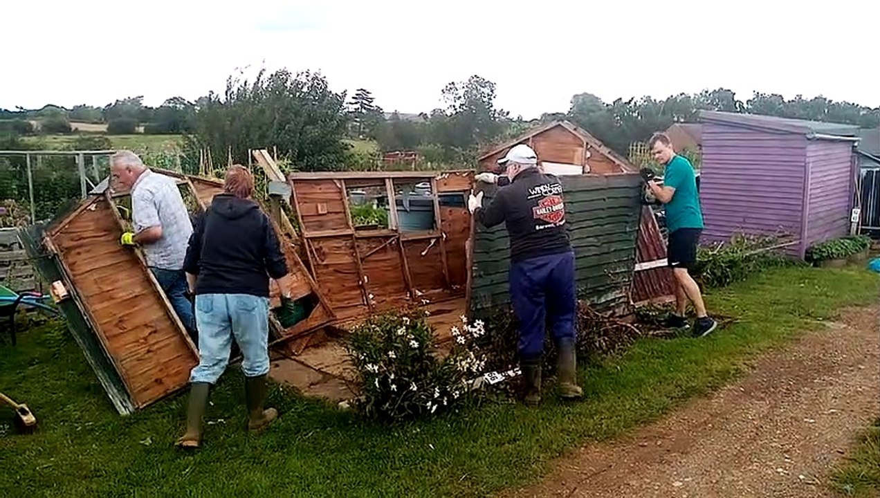 Residents at Moulton Allotments CIC clean up the wreck left behind by Northampton tornado