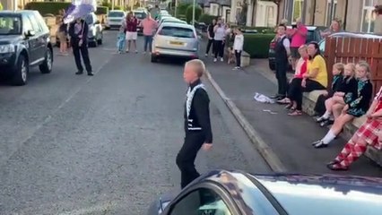 Boy dancing in street