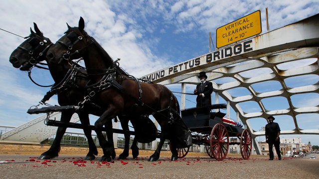 Body of John Lewis makes final journey over Selma bridge