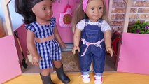 Baby dolls cleaning the doll horse stables house by American GIrl Dolls!