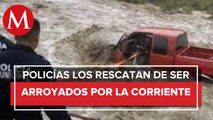 Rescatan a padre e hijo que fueron arrastrados por la corriente en Coahuila