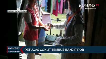 Petugas Coklit Terobos Banjir Rob