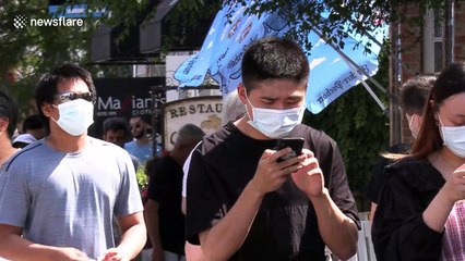 Gamers wear face masks during Pokemon Go Fest in Markham, Canada