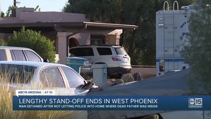 Man detained after not allowing officers inside the home where dead father was