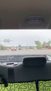 Truck Loses Strapped Bed in Intersection