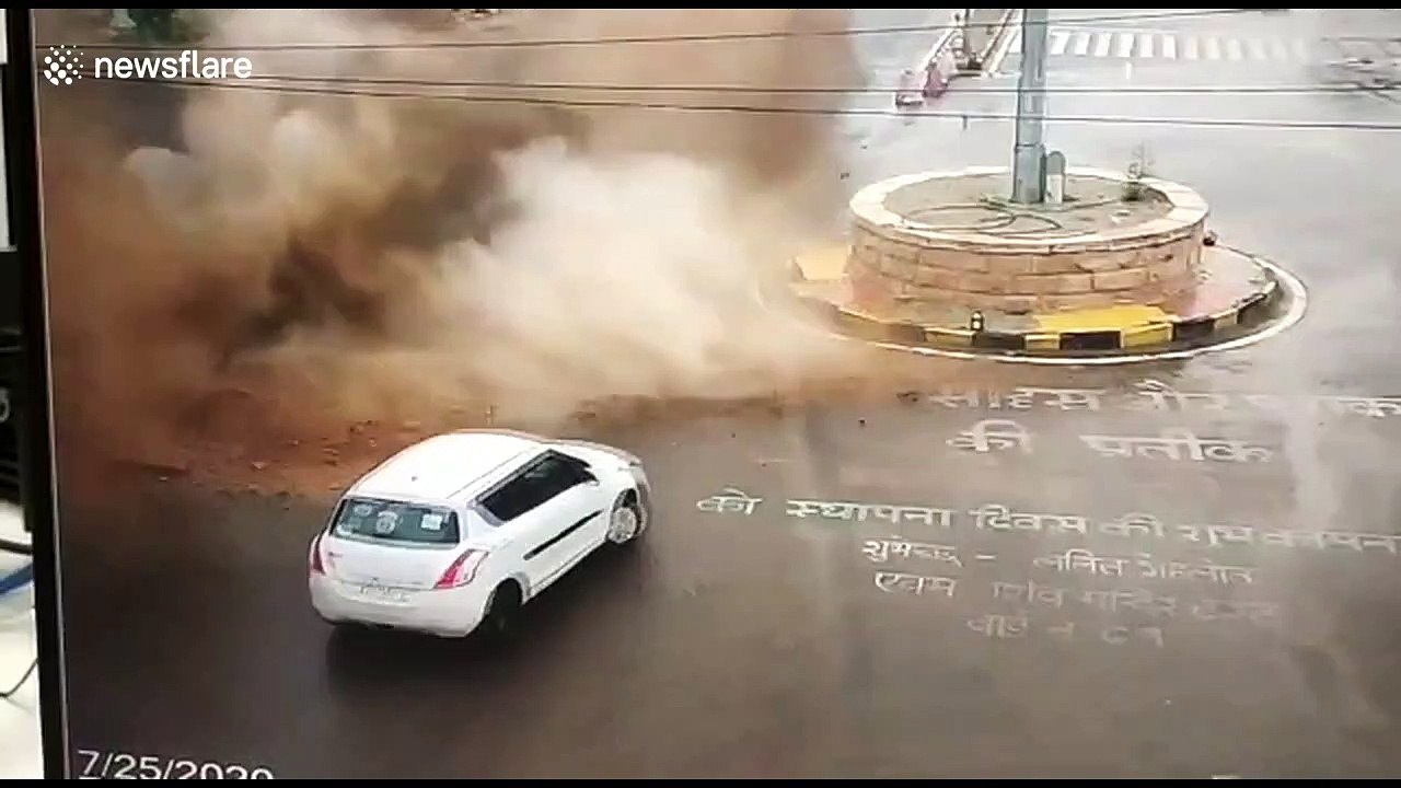 Driver has lucky escape after pipe explodes under street in northwest India