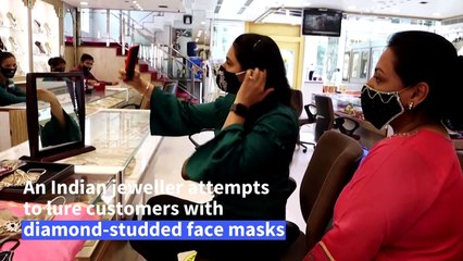 Indian jeweller creates diamond-studded virus masks