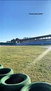 Valentino Rossi ed Uccio su una Ferrari sul circuito di Misano