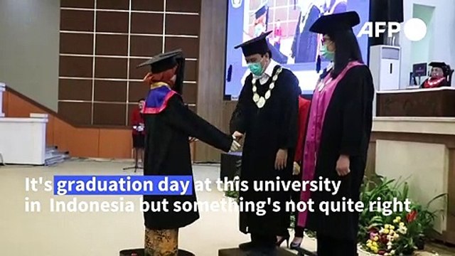 Robots stand in graduates' place in Indonesian university
