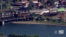 Train derails, causing fire and partial Tempe Town Lake bridge collapse