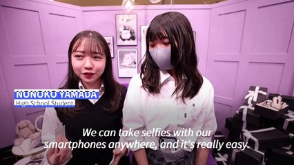 Japan's purikura photo booths cling on