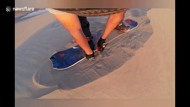 Sandboarder rides epic and spectacular dunes in the Chilean Desert