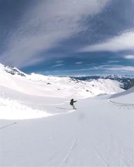 Duo Does Snowboarding While Going Downhill