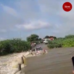 Dramatic escape for two as car gets washed away in Andhra’s Anantapur
