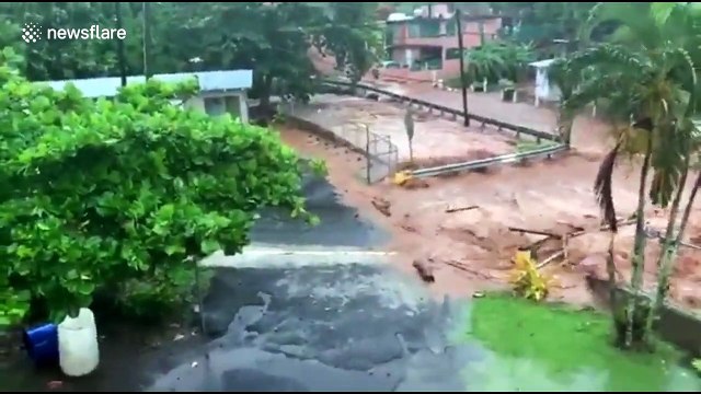 Tropical Storm Isaias hits Puerto Rico with life-threatening flash floods and gusty winds